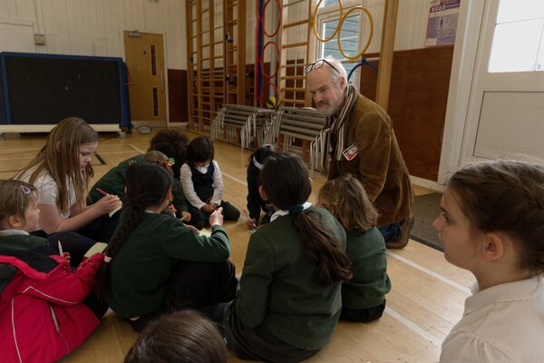 Children sat listening to a story